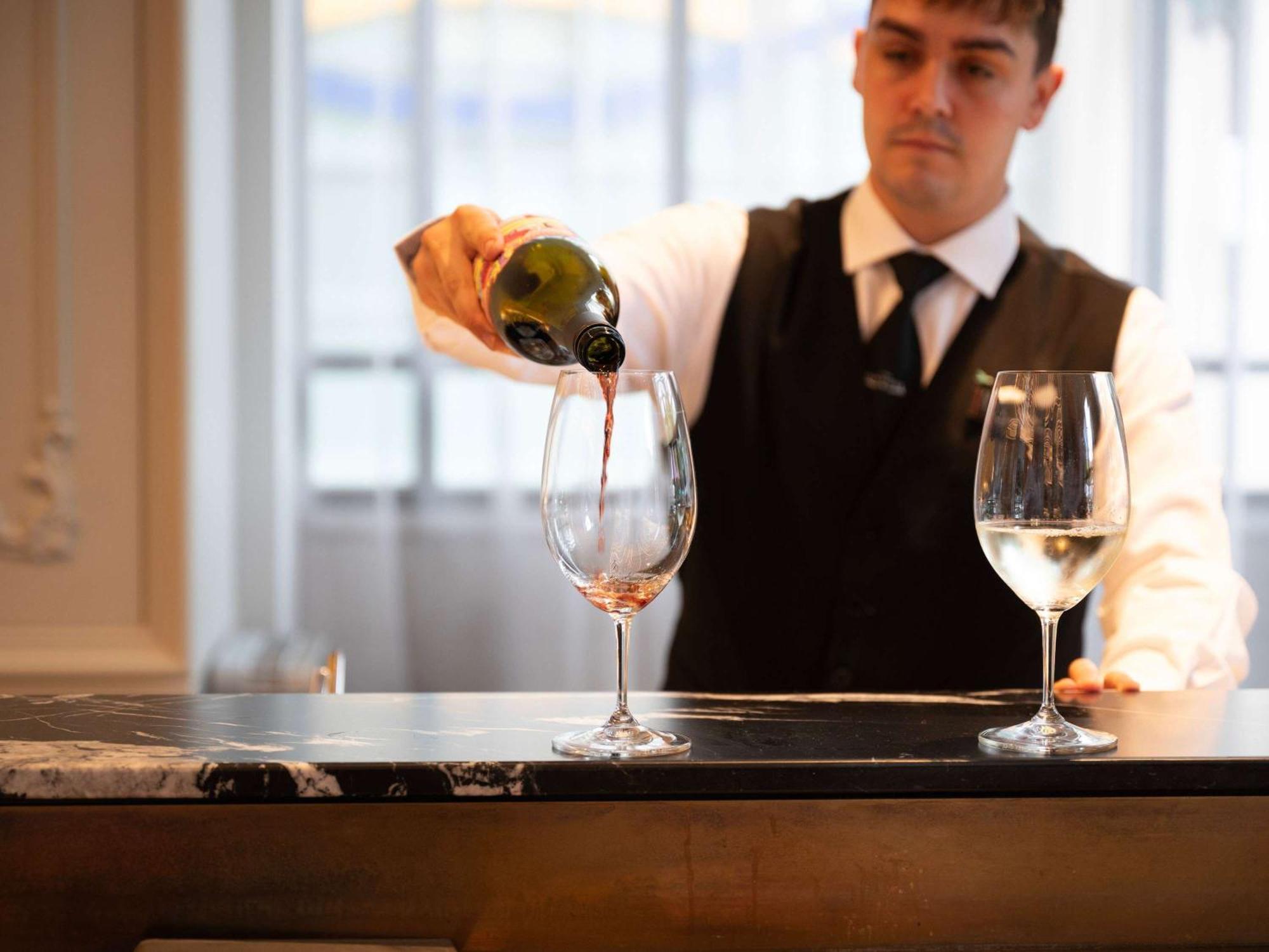 The Playford Adelaide - Mgallery Экстерьер фото A sommelier pouring wine