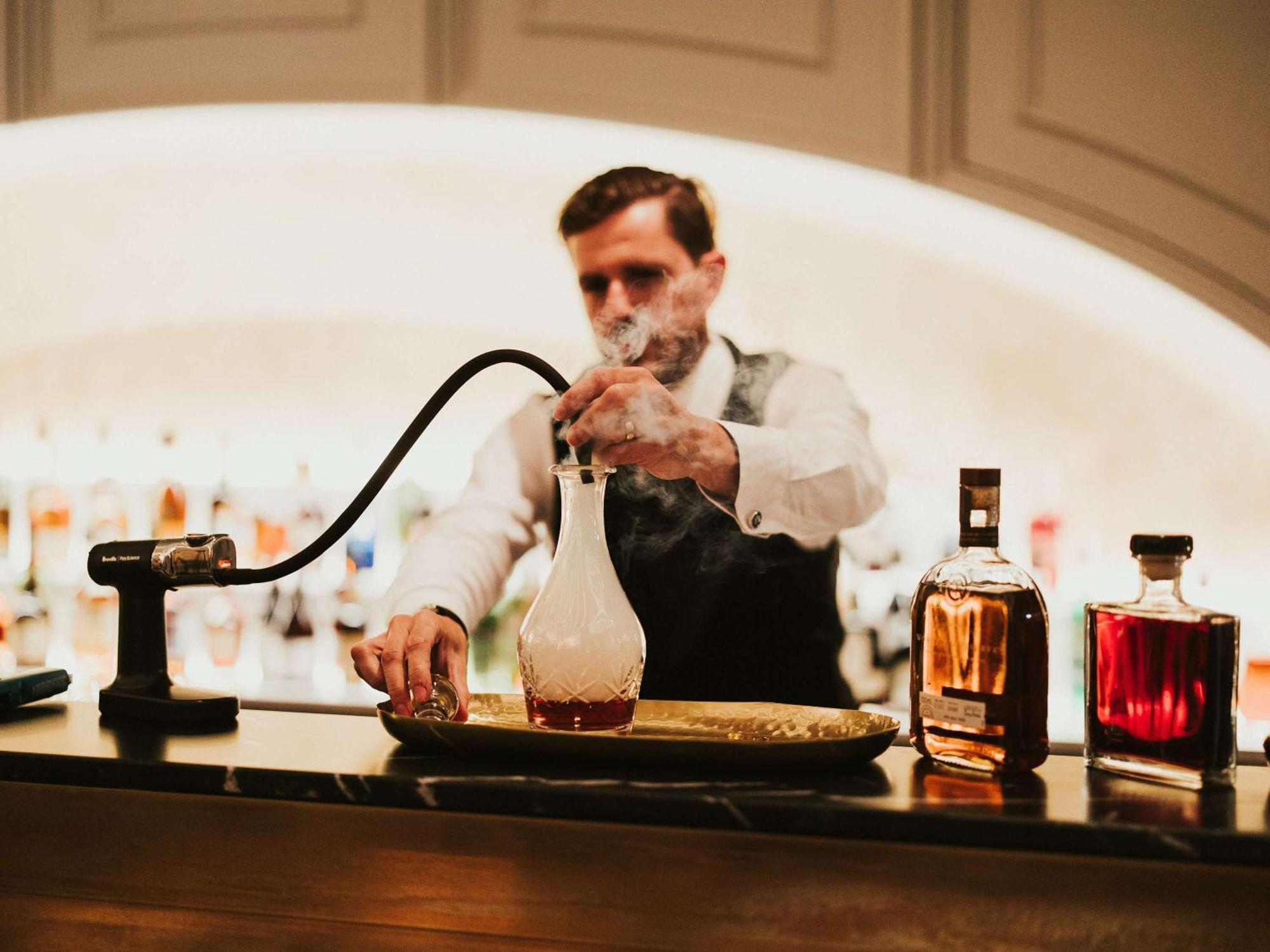 The Playford Adelaide - Mgallery Экстерьер фото A bartender at work