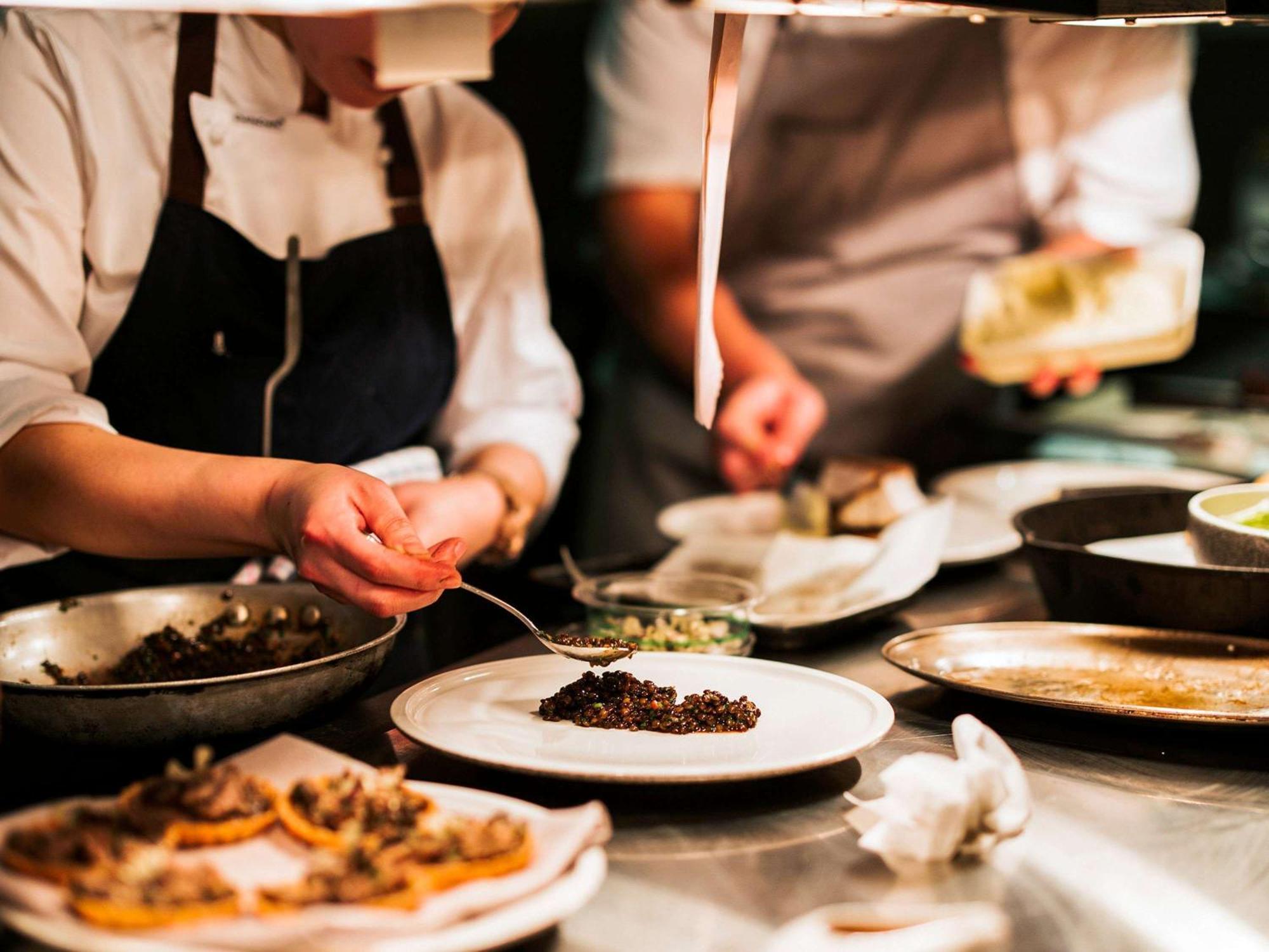 The Playford Adelaide - Mgallery Экстерьер фото A chef plating a dish